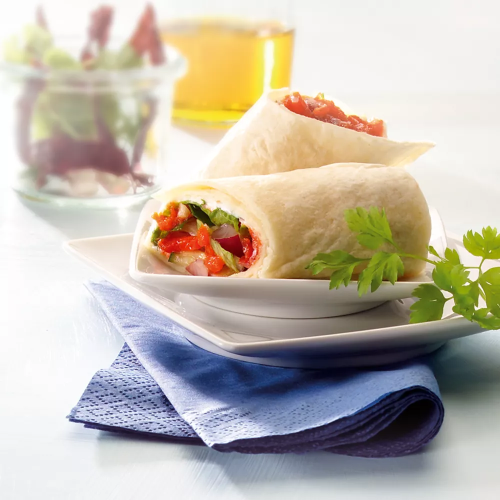 Seelachsschnitzel-Wrap mit Kräuterquark